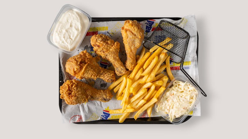 Catering spread with chicken and sides